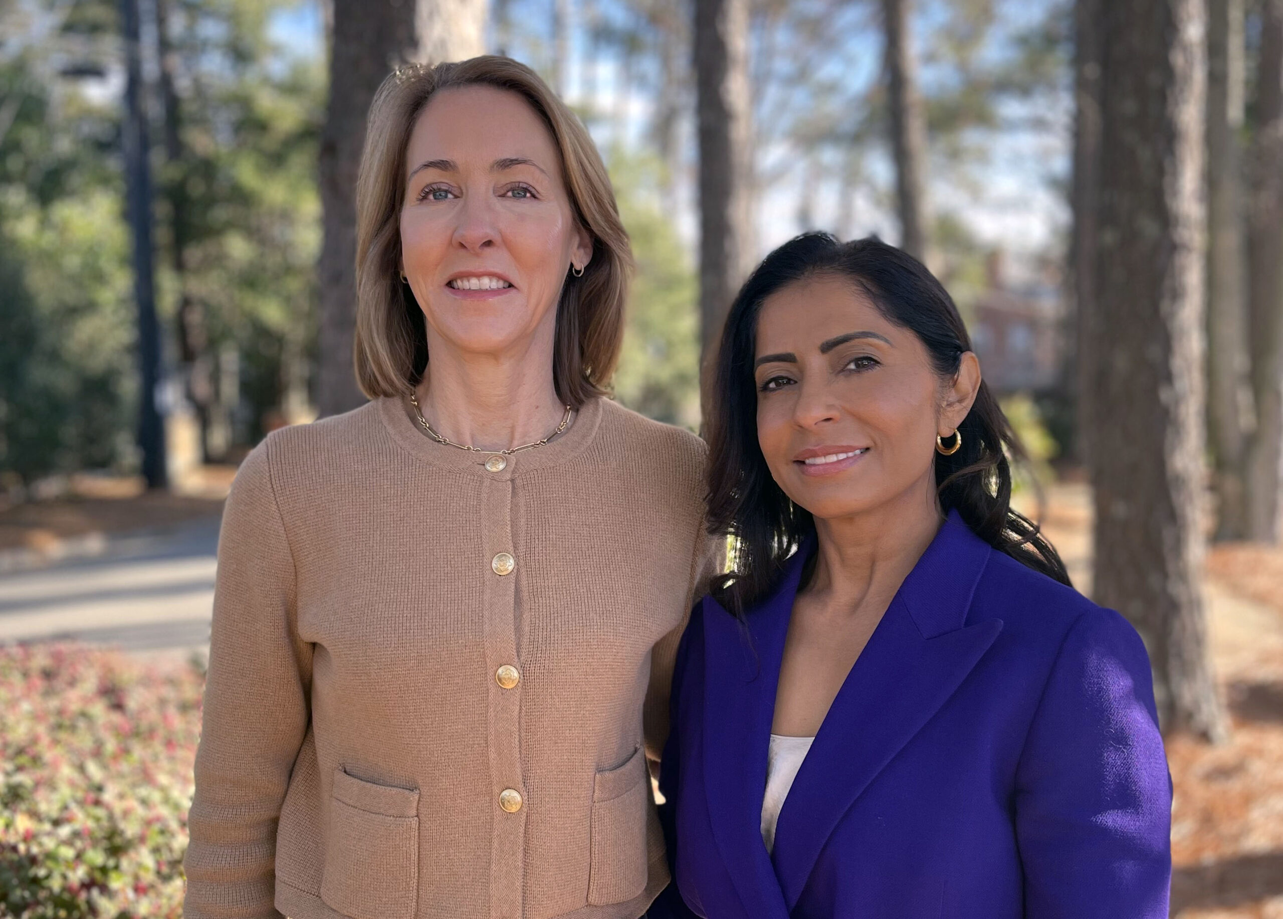 two women standing outside 2024 Benefits of Laughter event chairs Frances Kerr and Sharmila Prabhu