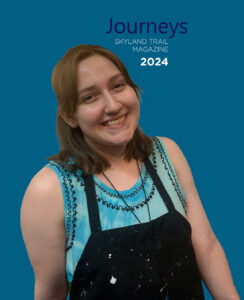 Young woman smiling - Journeys - Skyland Trail Magazine 2024