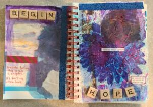 handmade journal from art therapy showing the words begin and hope with art