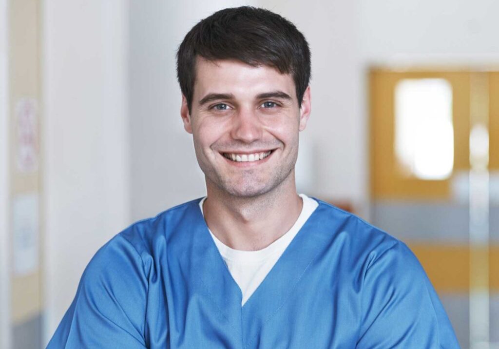 a photo of a smiling male nurse